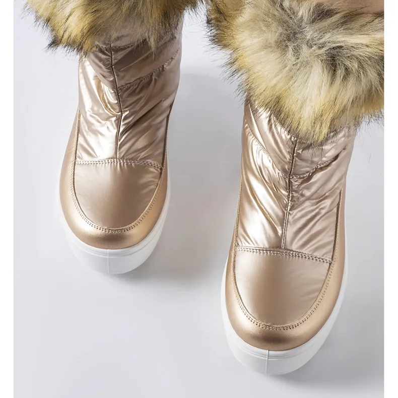 Igne metallic snow boots with decorative fur golden