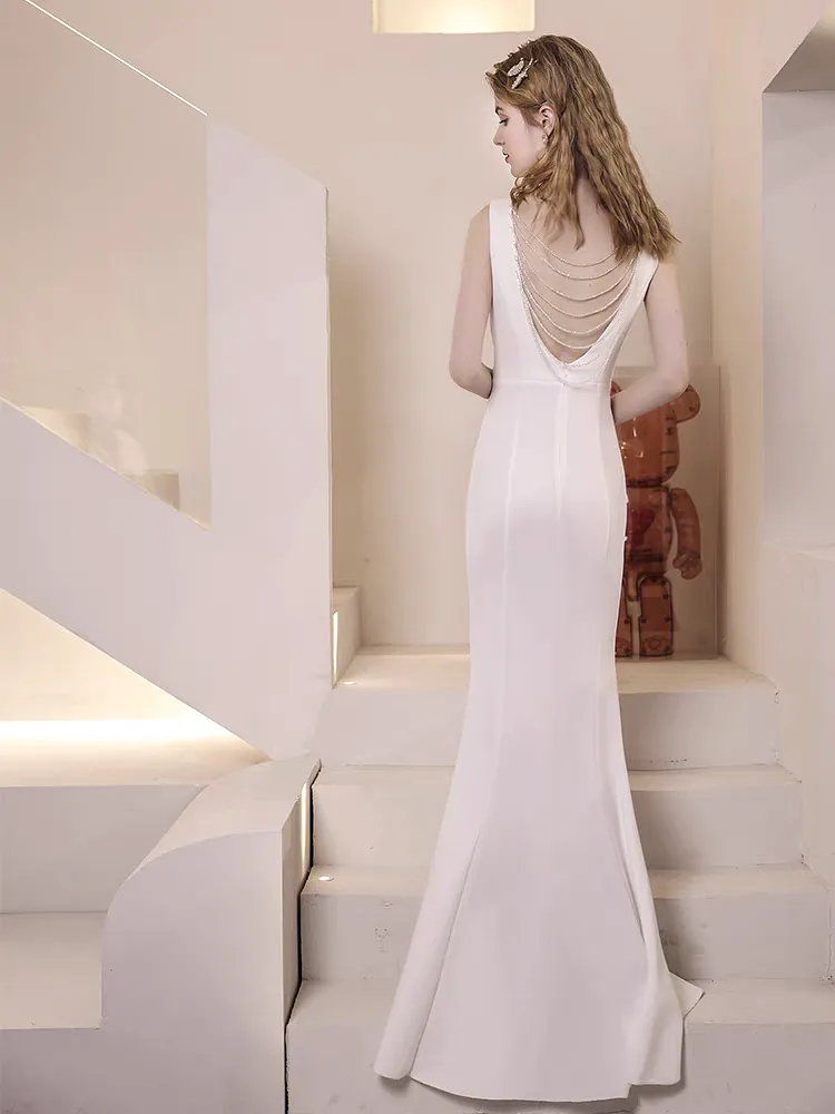 The Lalitha White Sleeveless Dress (With Back Details)